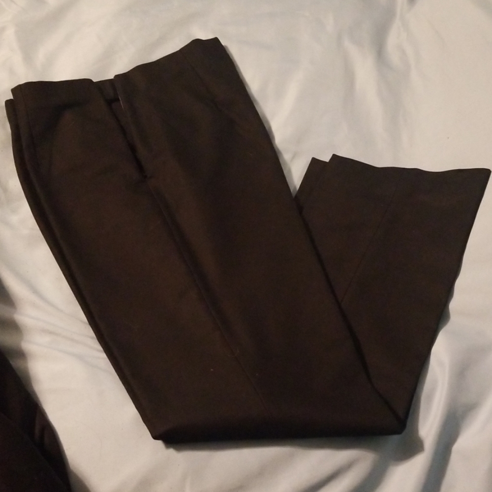Dress pants have been hemmed.